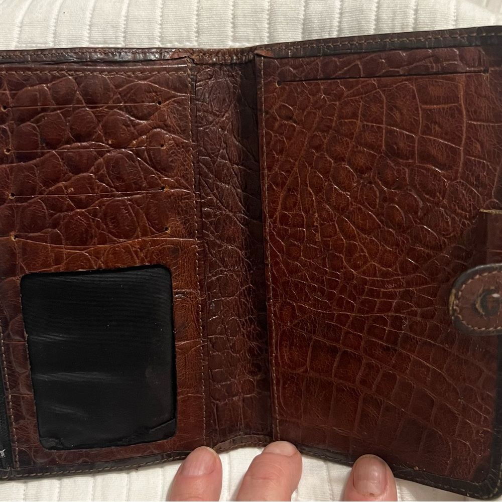 Embossed leather day planner/wallet with snap closure by Raika